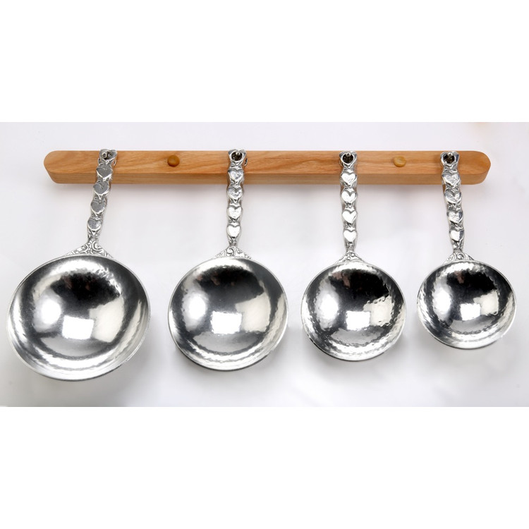 Hearts Pewter Measuring Cups on Cherry Strip